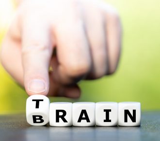 Train your brain. Dice form the words train and brain.